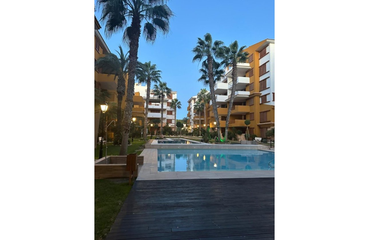 Revente - Appartement -
Punta Prima - Costa Blanca