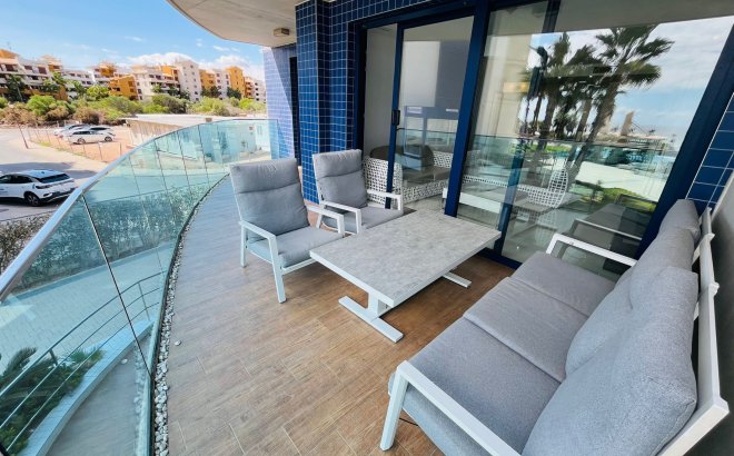 Revente - Appartement -
Punta Prima - Costa Blanca